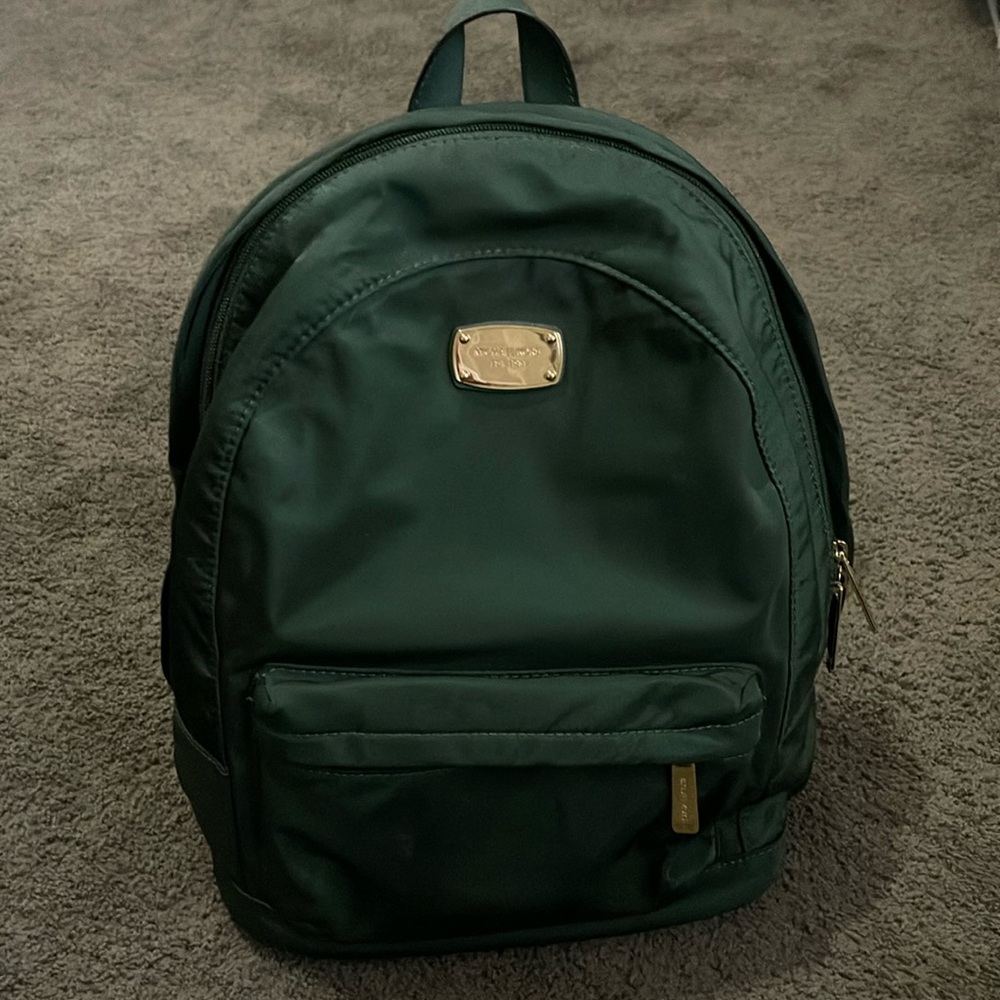 Michael Kors green backpack